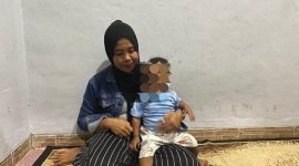 Siti Mauliah (37), orang tua yang bayinya tertukar di Bogor setelah satu tahun melahirkan. (Dok. Tribun Bogor) 