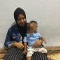 Siti Mauliah (37), orang tua yang bayinya tertukar di Bogor setelah satu tahun melahirkan. (Dok. Tribun Bogor) 